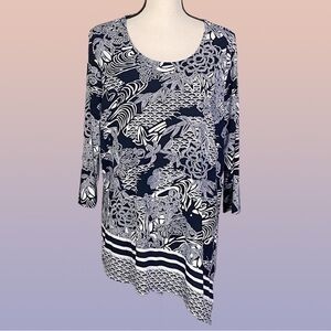 CHICO’S black & white abstract, asymmetrical jersey blouse. Size “3”=XL/16. EUC